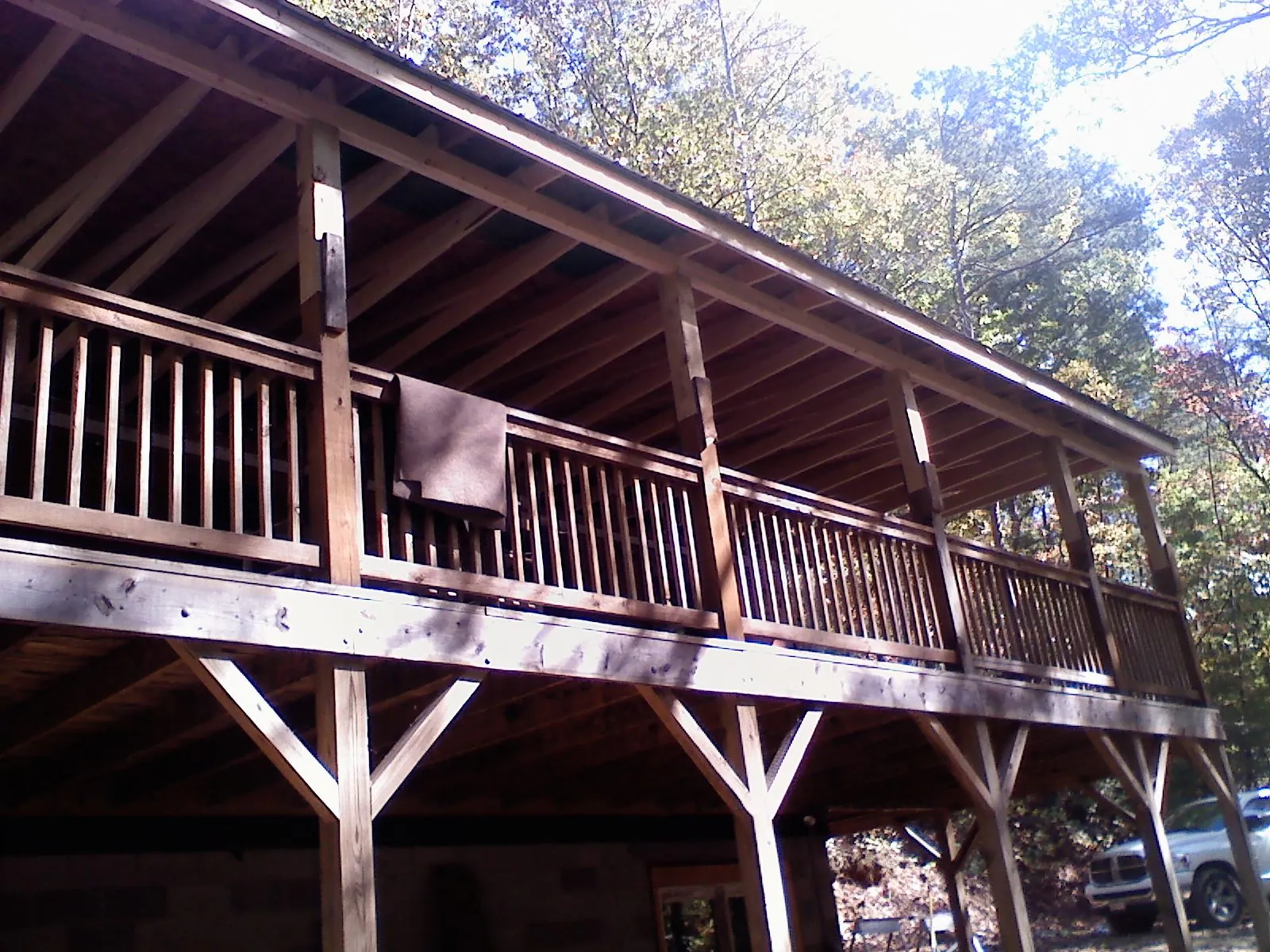 Timber framing under a new elevated porch and deck — Roof Leak Repair in Okemos by Roofing Brothers